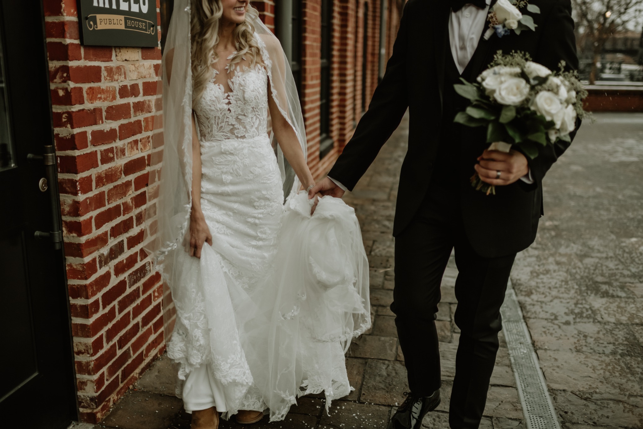 Newly married couple leaving their wedding